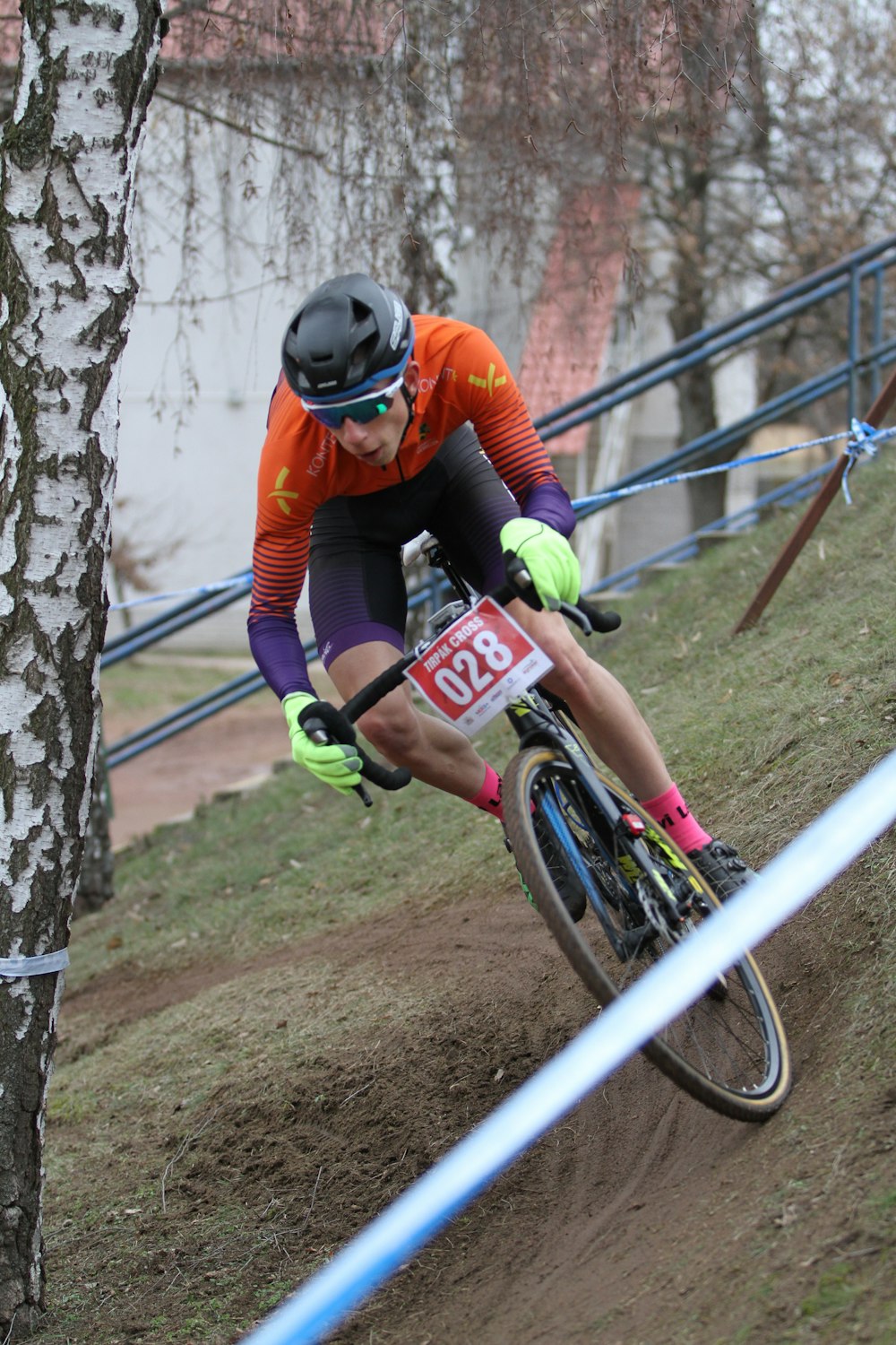 cyclist running on obstacle course