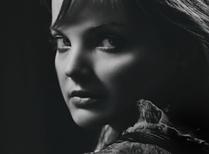An elegant black and white portrait capturing deep emotions.