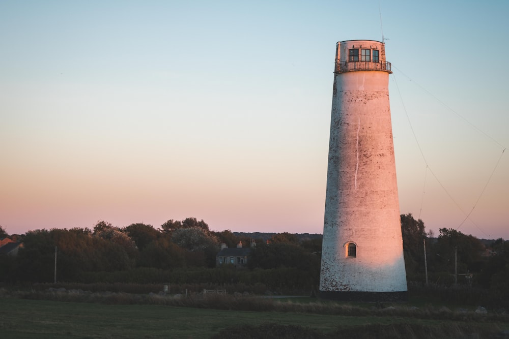 white lighthouse during daytime