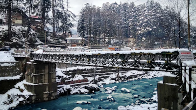 black metal bridge during daytime