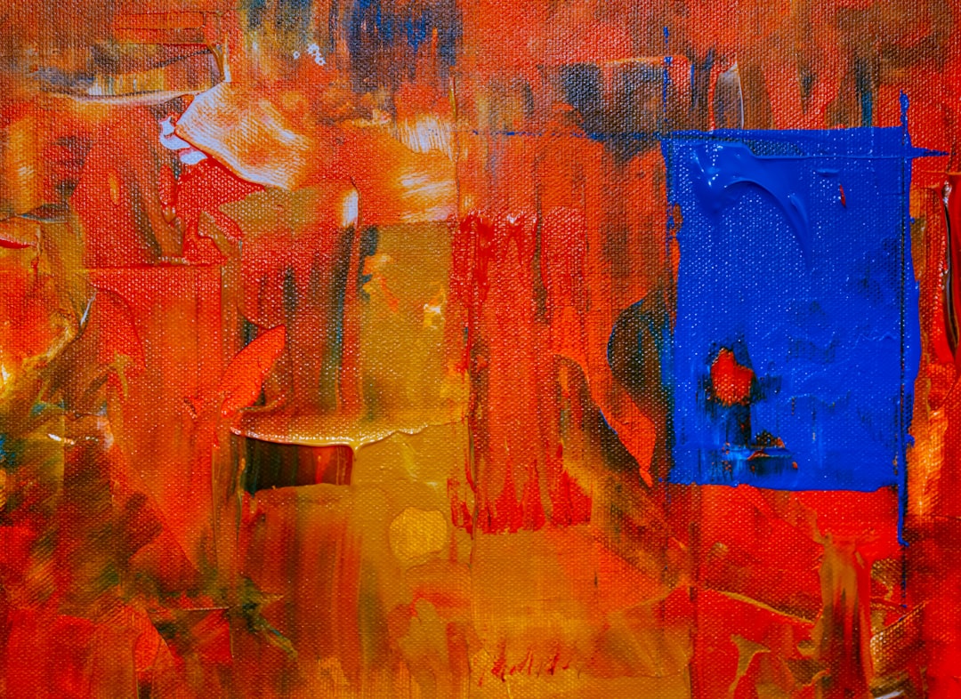 blue, red, and orange abstract painting