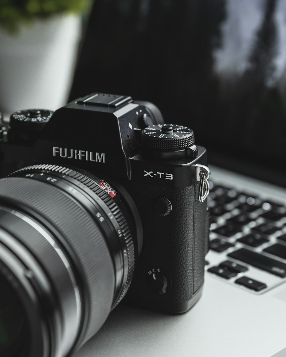 black FujifiLM DSLR camera