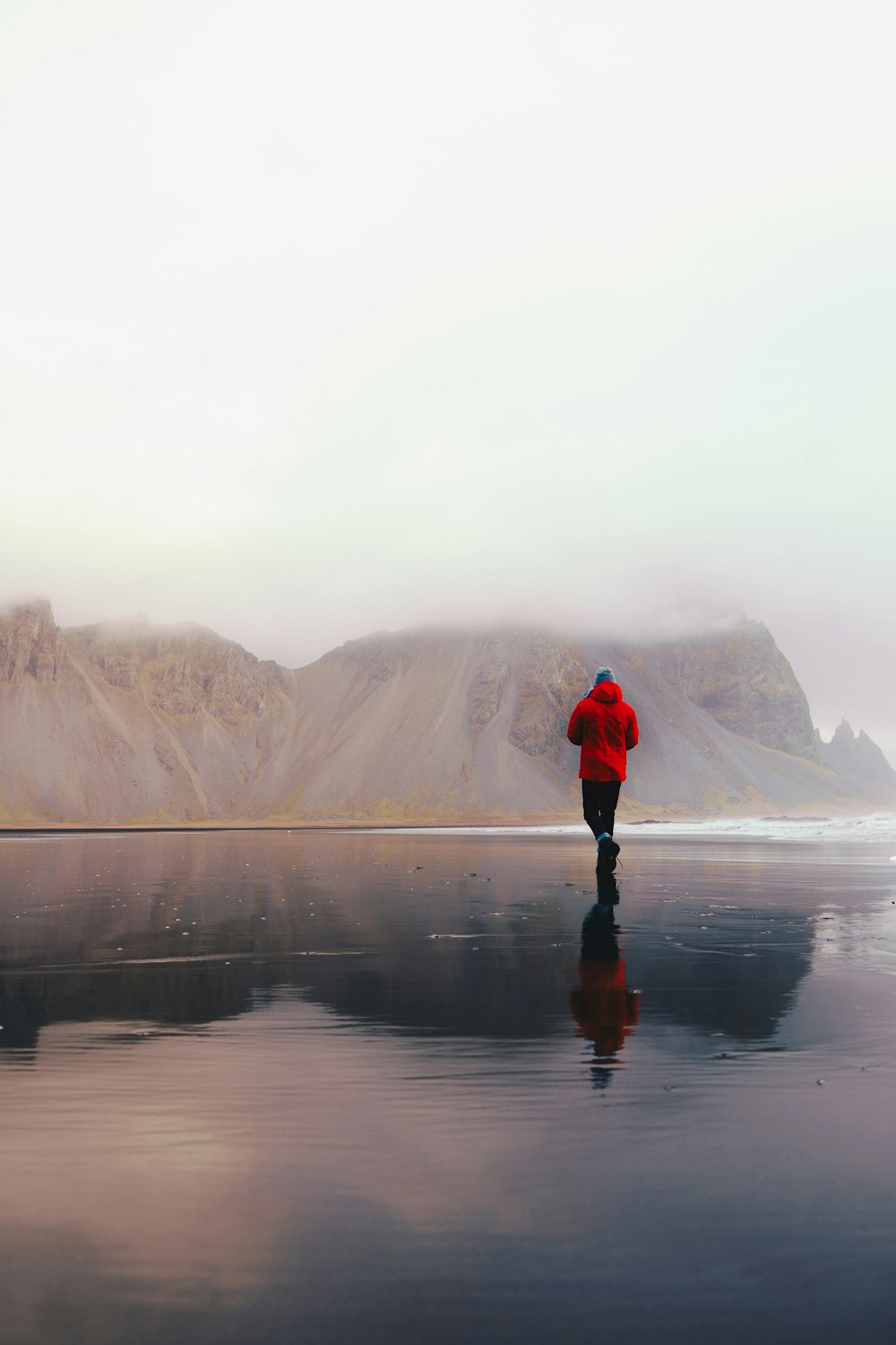 person wearing red coat