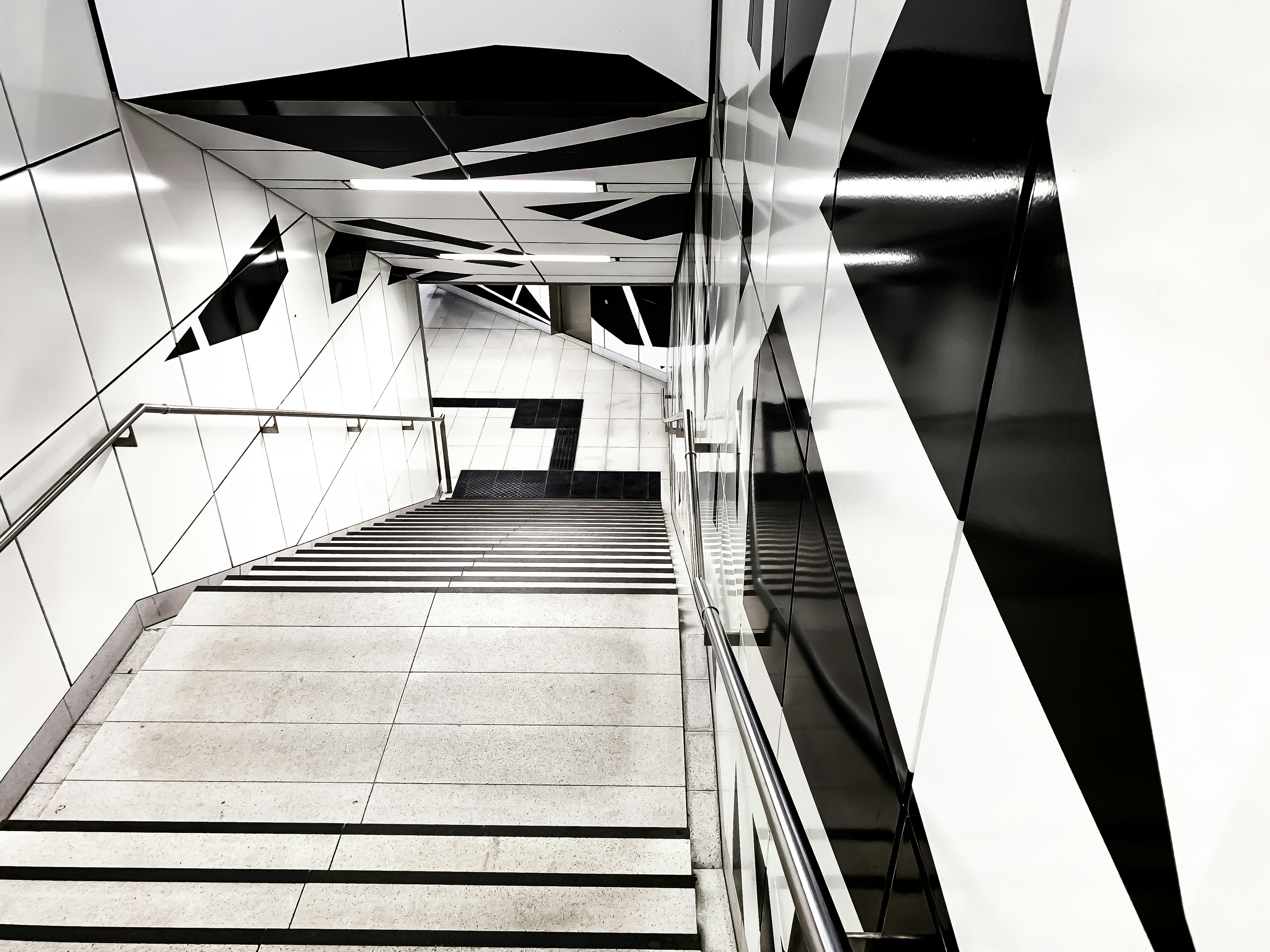 A sleek, modern building facade with glowing abstract digital lines superimposed, representing AI analyzing structured property data.