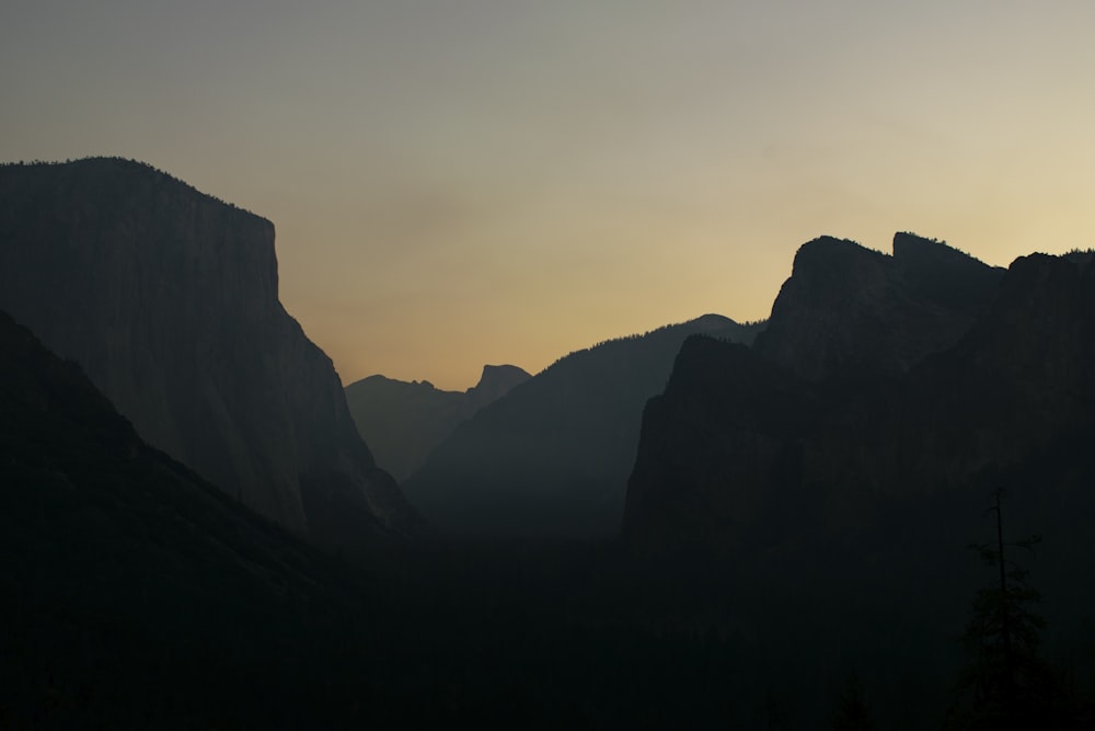 silhouette of mountains during golden hour