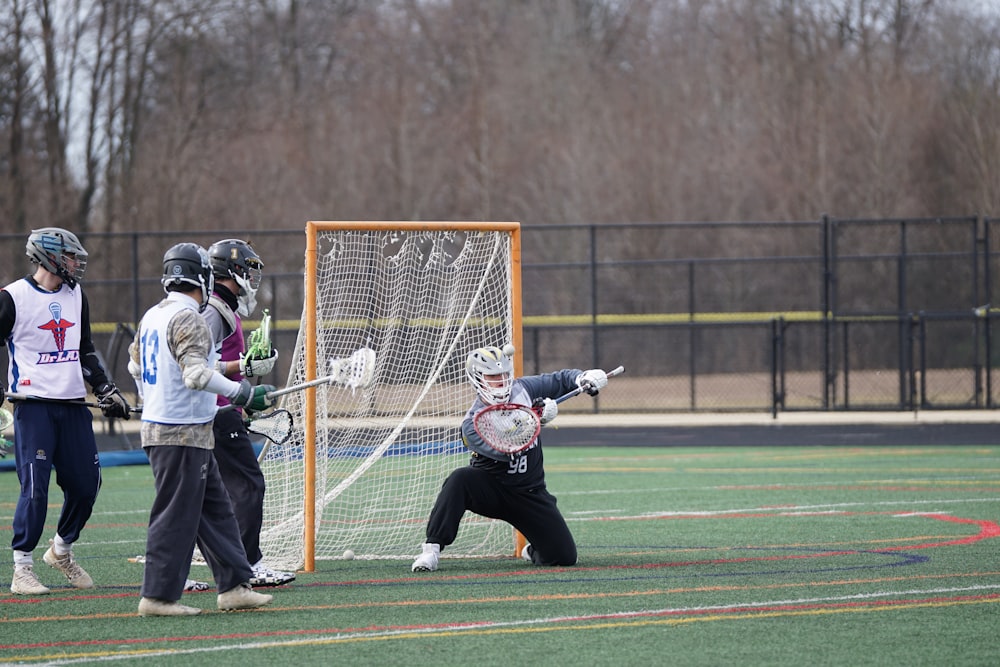 men playing lacrosse