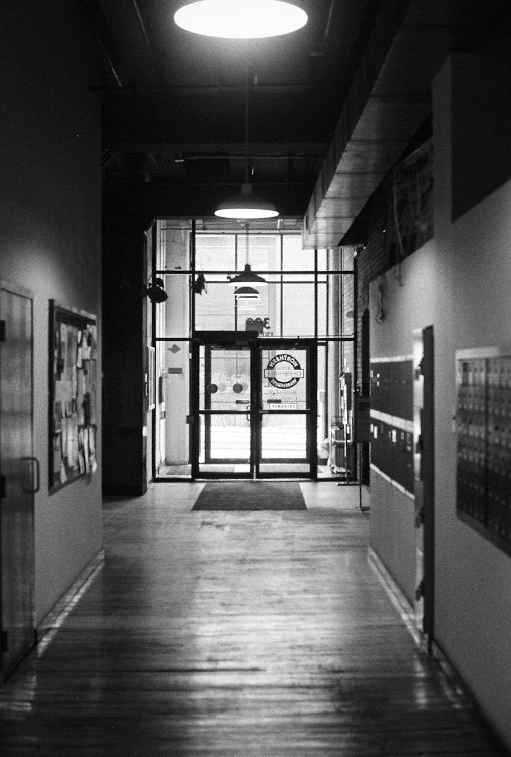 grayscale photography of empty hallway