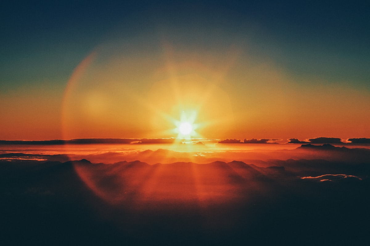 A peaceful silhouette against a glowing sunset
