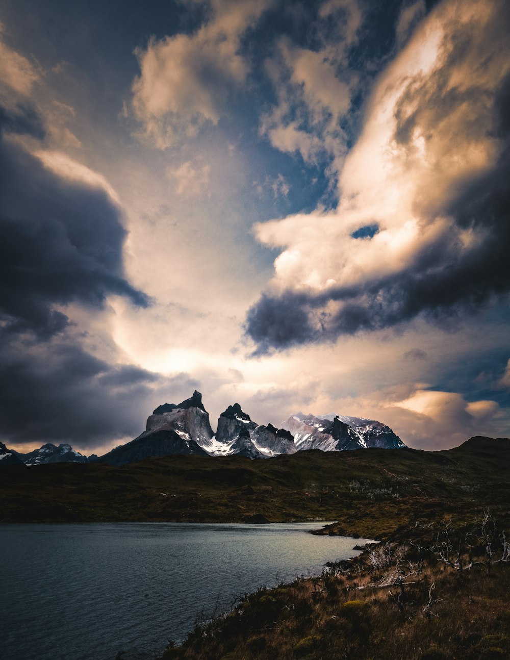 mountain with the distance of body of water