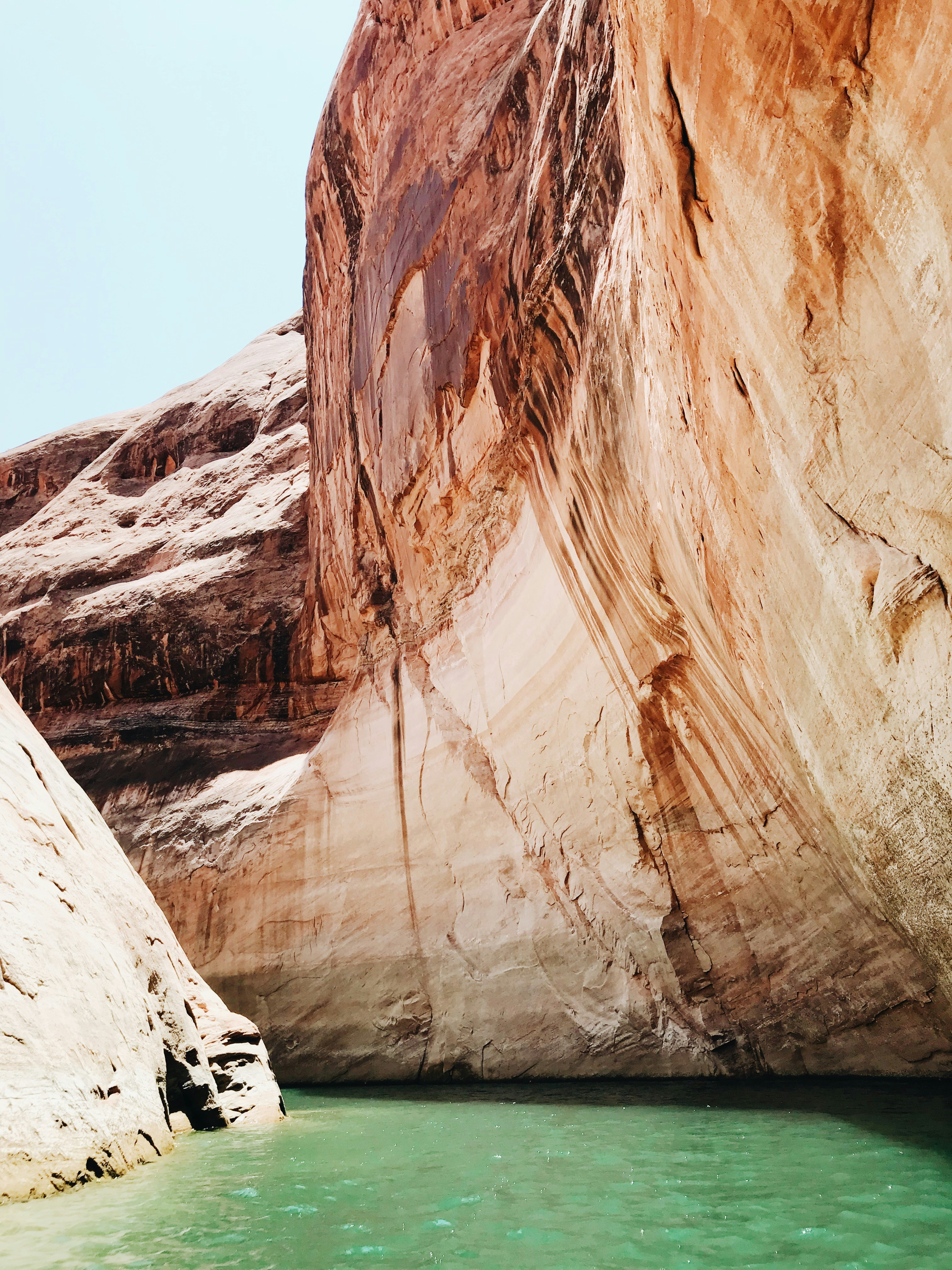 River between brown mountains during daytime photo Free Tonalea Image