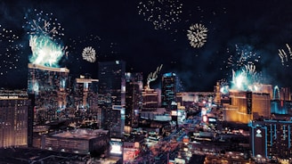 city with fireworks during night time