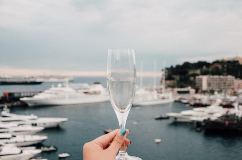 woman holding champagne glass