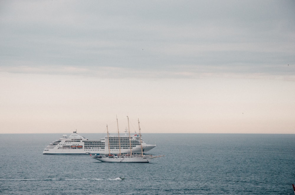 white ship in the middle of the sea