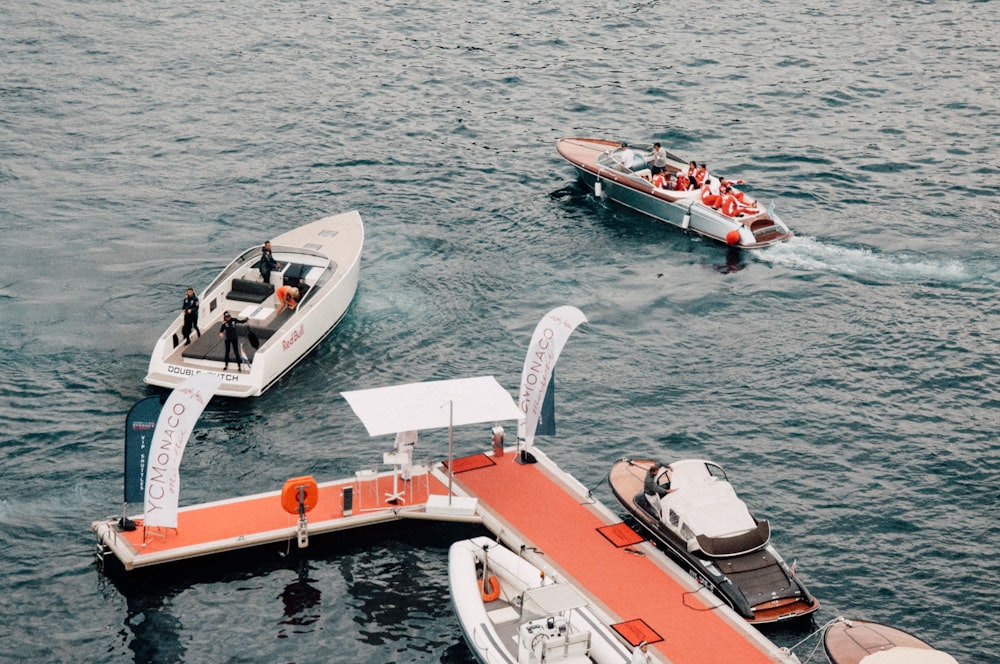 people riding boats