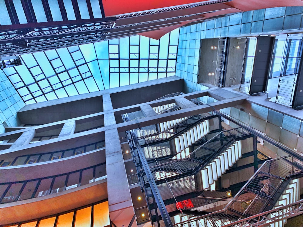 low-angle photography of building staircase during daytime