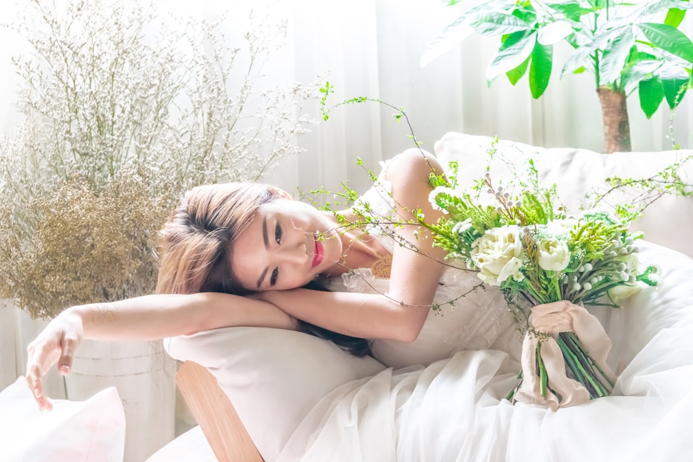 woman laying down on sofa