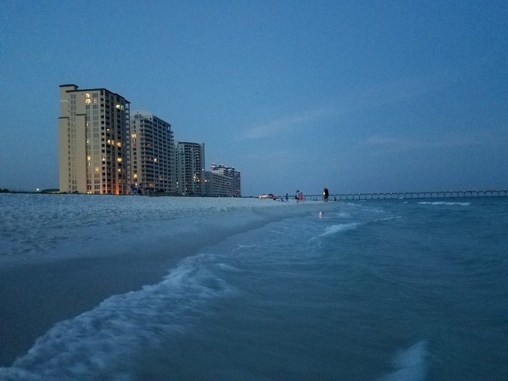 selective focus photography of sea near building