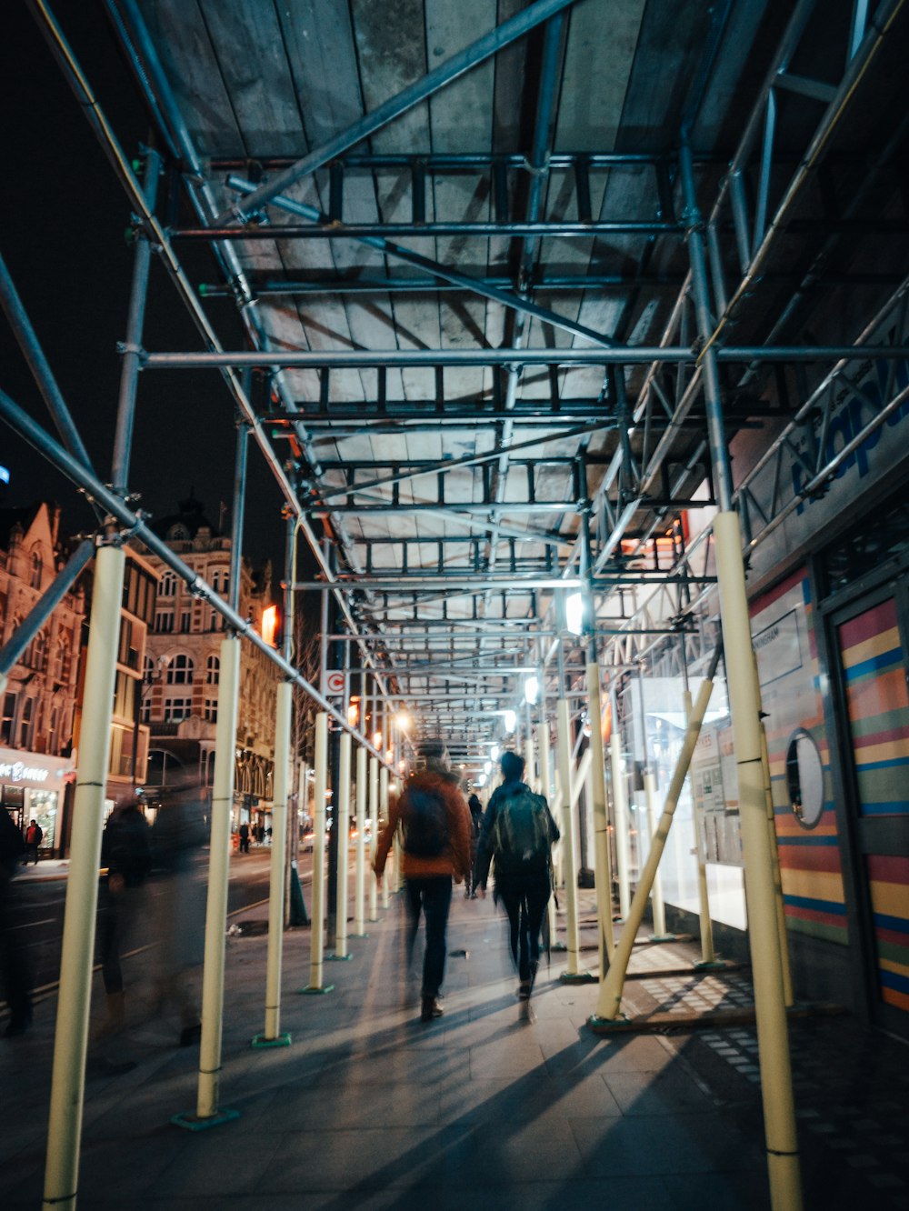 people walking on sidewalk time lapse photography