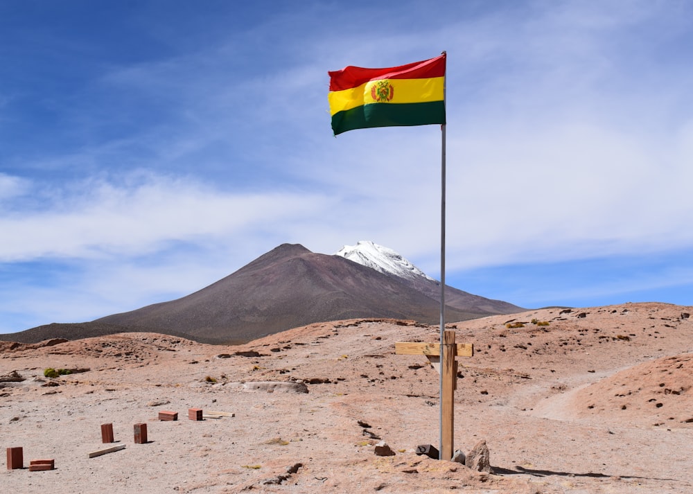 Bandera clavada en el suelo