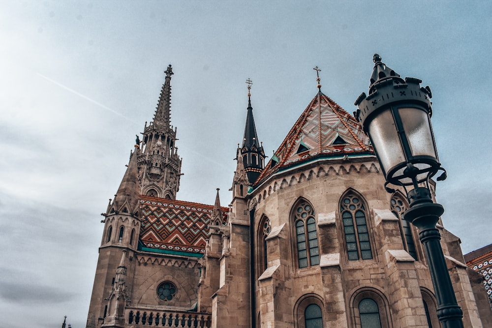 low-angle photography of brown castle during daytime