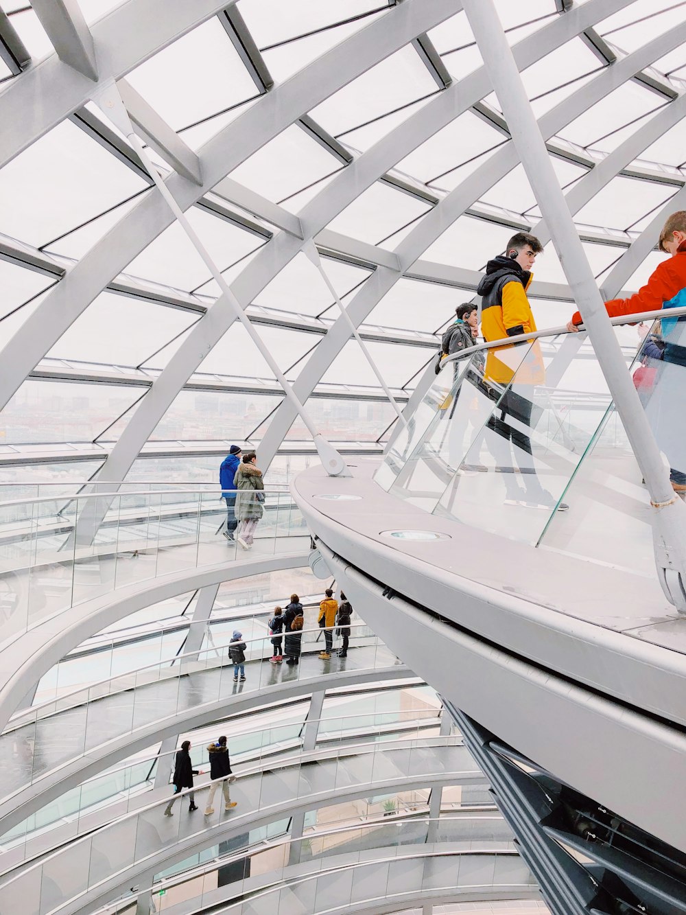 people walking inside multi-story building