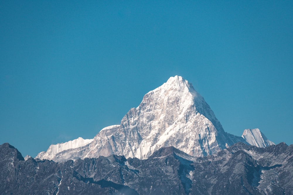 snow covered mountain during daytime