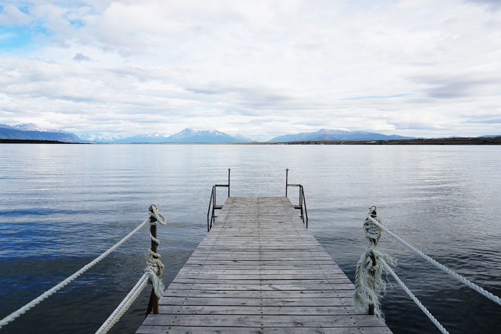 wooden bridge on lake