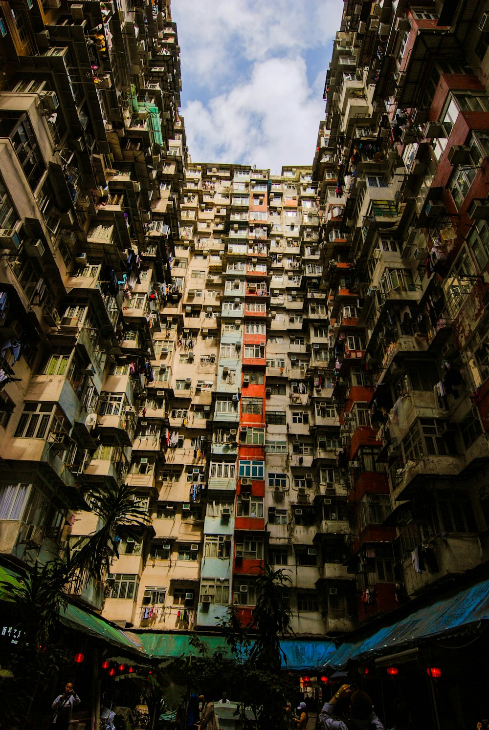 low-angle photography of assorted-color building during daytime