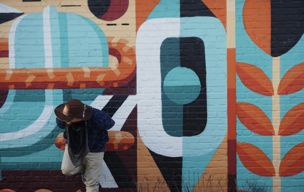 person standing behind wall