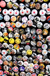 assorted-color button pin collection lot
