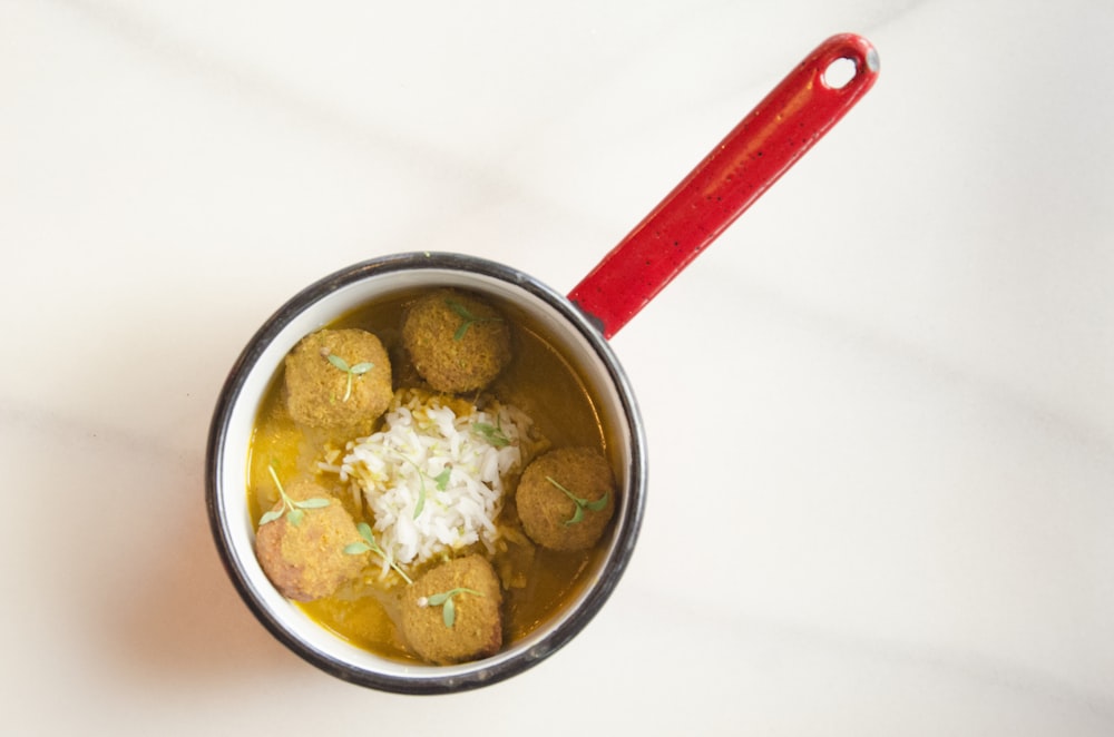 soup in white cooking pan