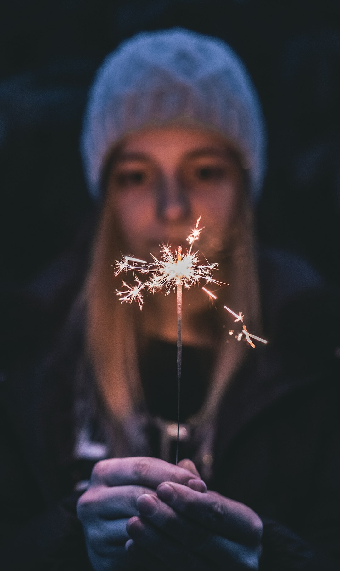 woman holding firecracker