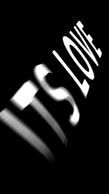 Stylized white text reading 'ITS LOVE' is set against a completely black background. The letters appear to be in motion or distorted, creating a dynamic and abstract visual effect.