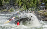 person riding boat during daytime