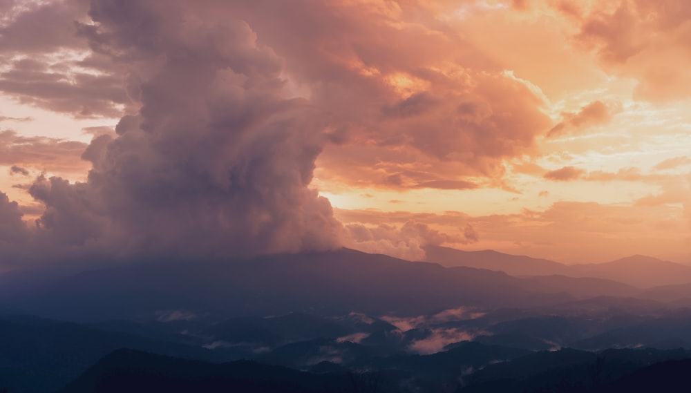 aerial view photography of mountain covered with clouds