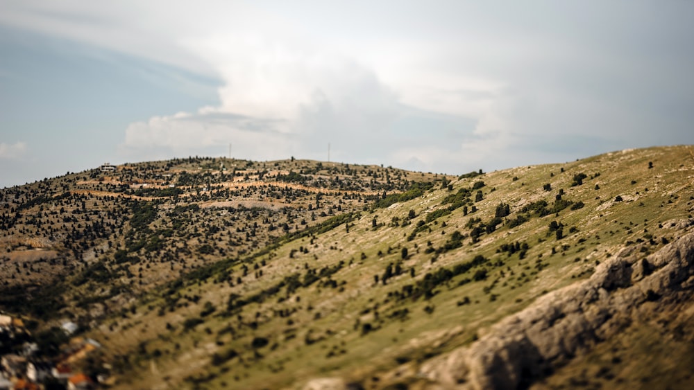 green mountain range under blue sky during daytime