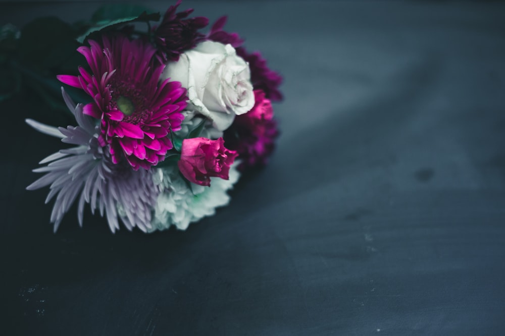 purple and white flower bouquet