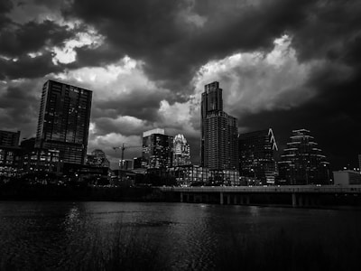 Blue-toned image of Houston skyline with digital data overlays.