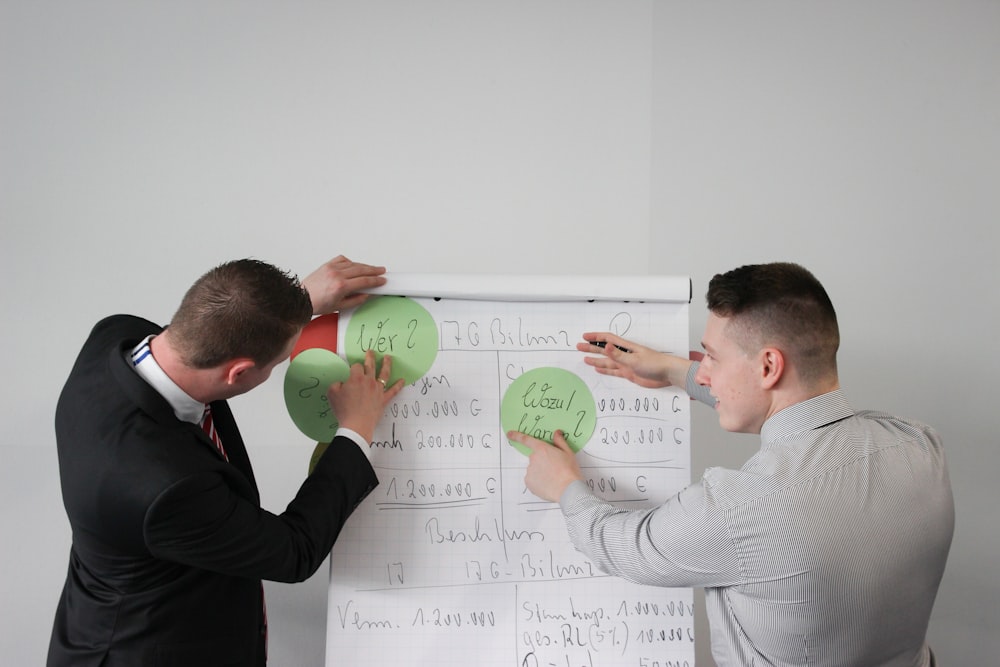 two men doing presentation visual aide