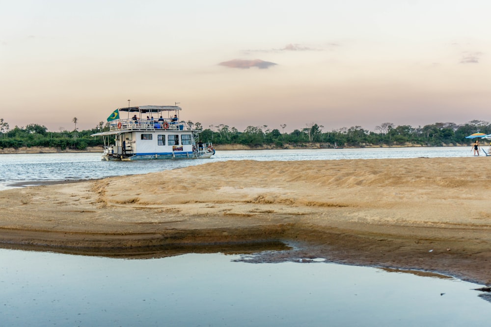 white motorboat during daytime