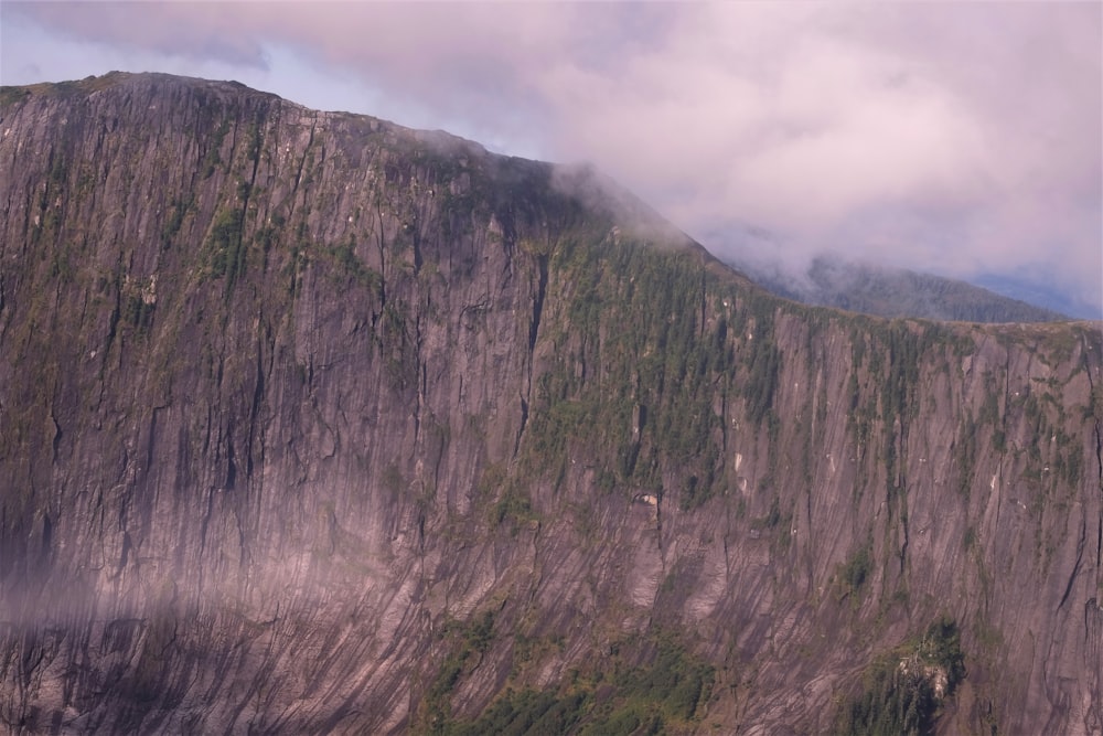 cliff covered with clouds