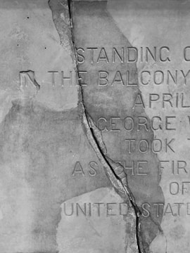 Before and after images showing restored faded inscriptions on a memorial stone.