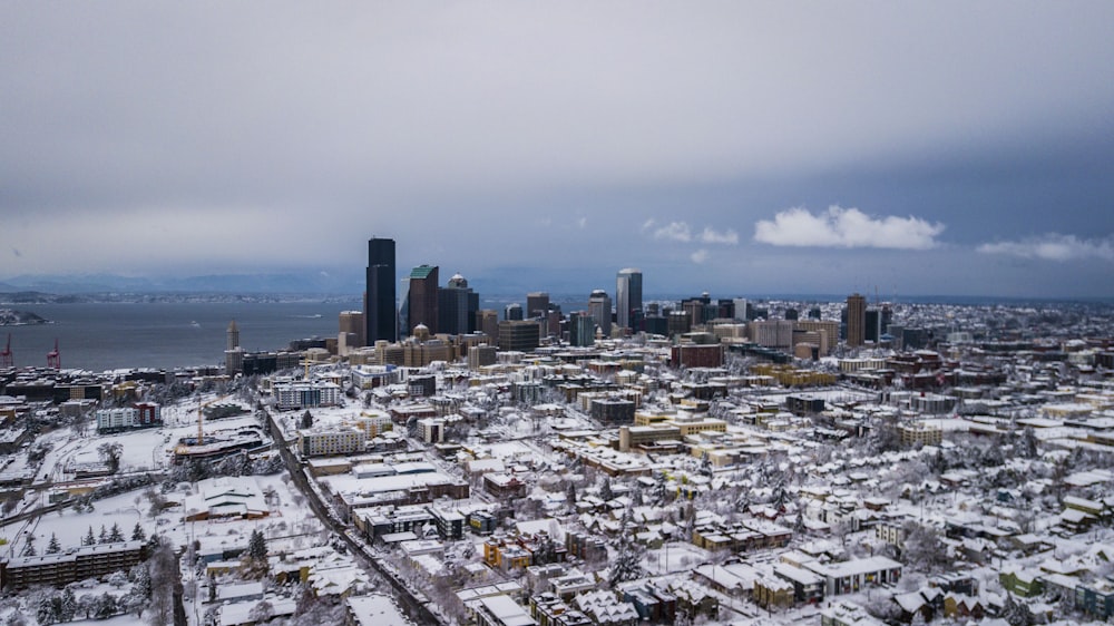 aerial photography of buildings under cloudy sky