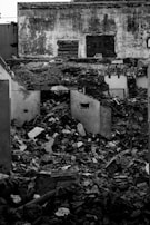 grayscale photo of abandon house