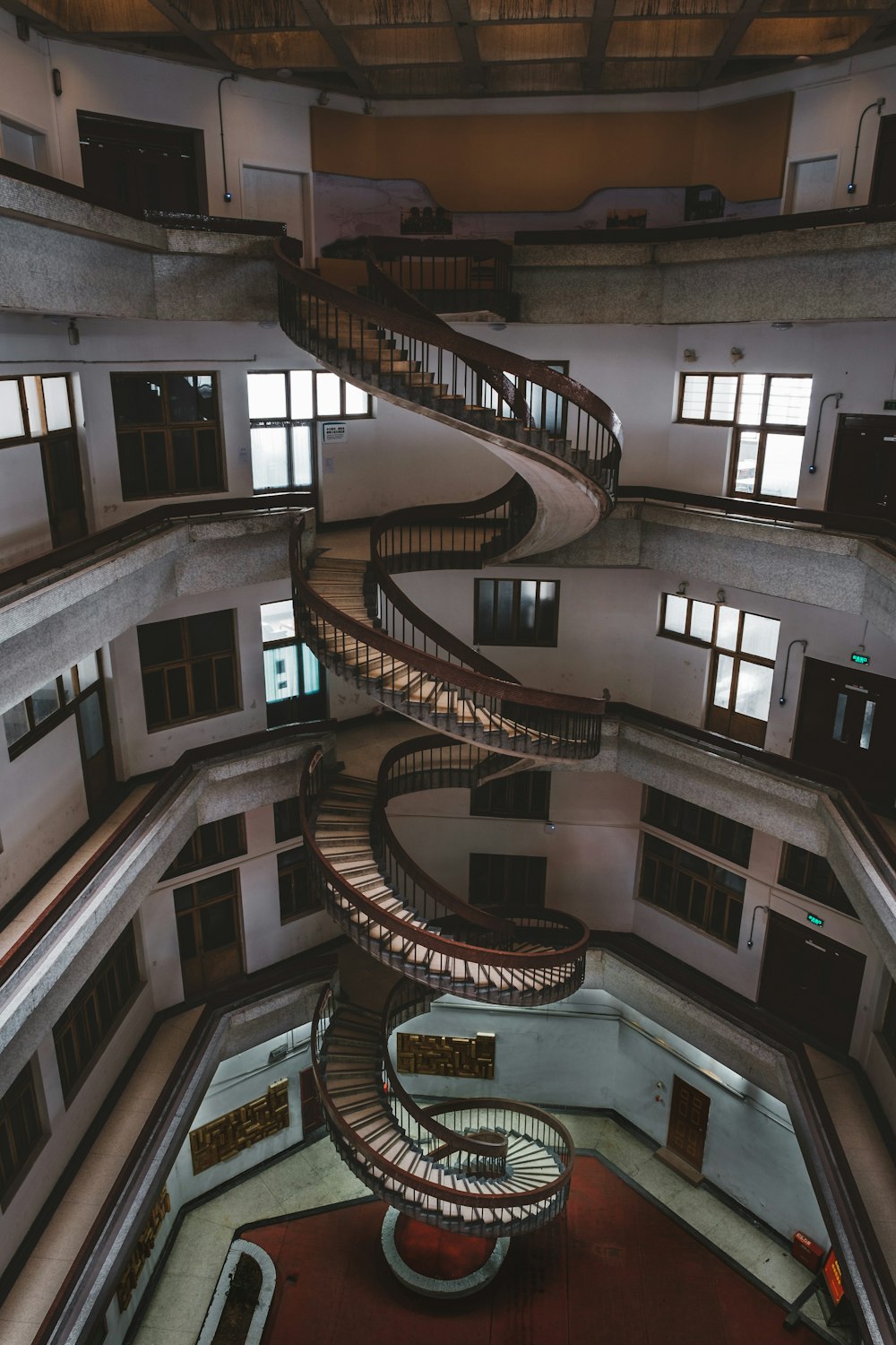 gray concrete spiral stair inside building