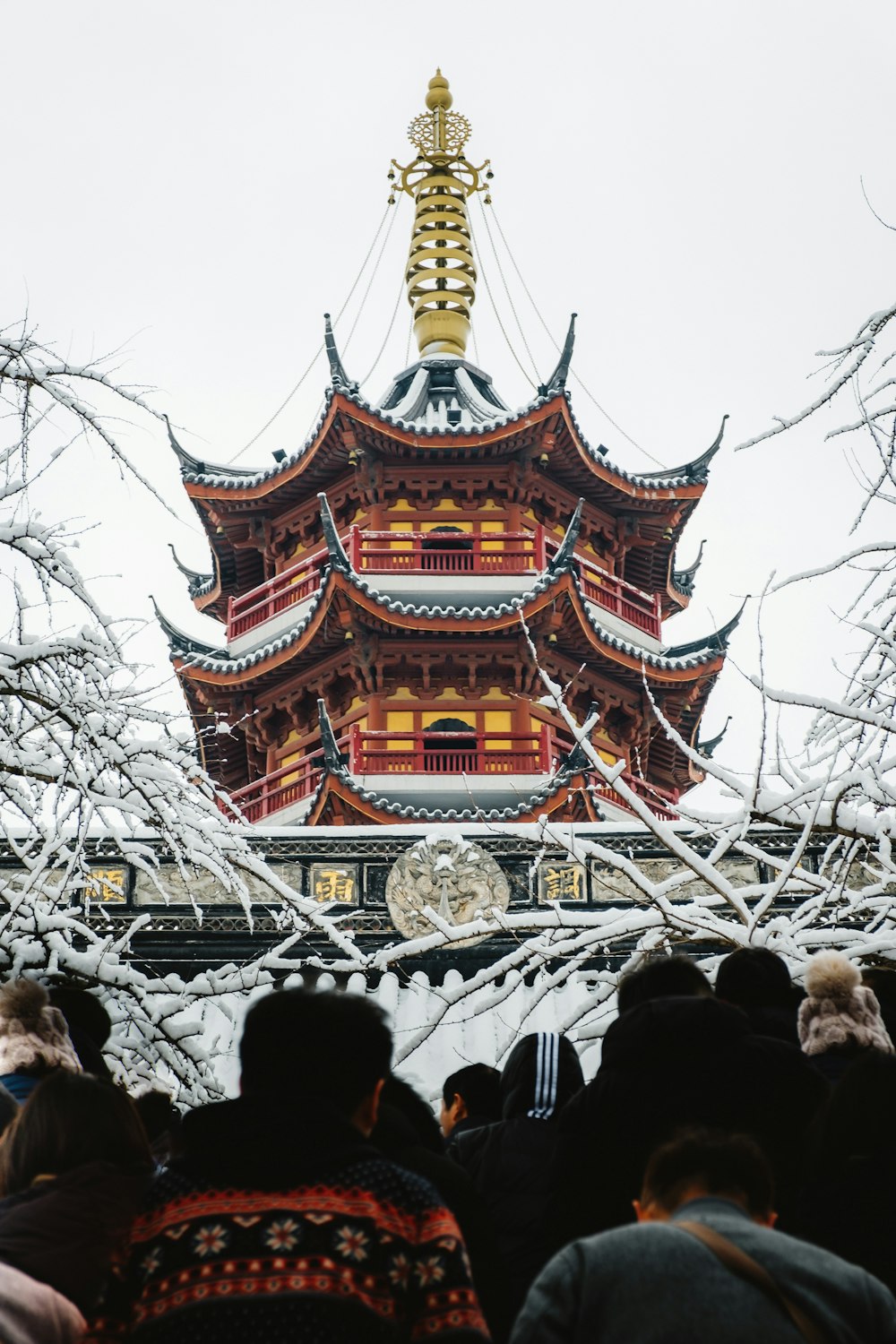 group of people gathering near temple