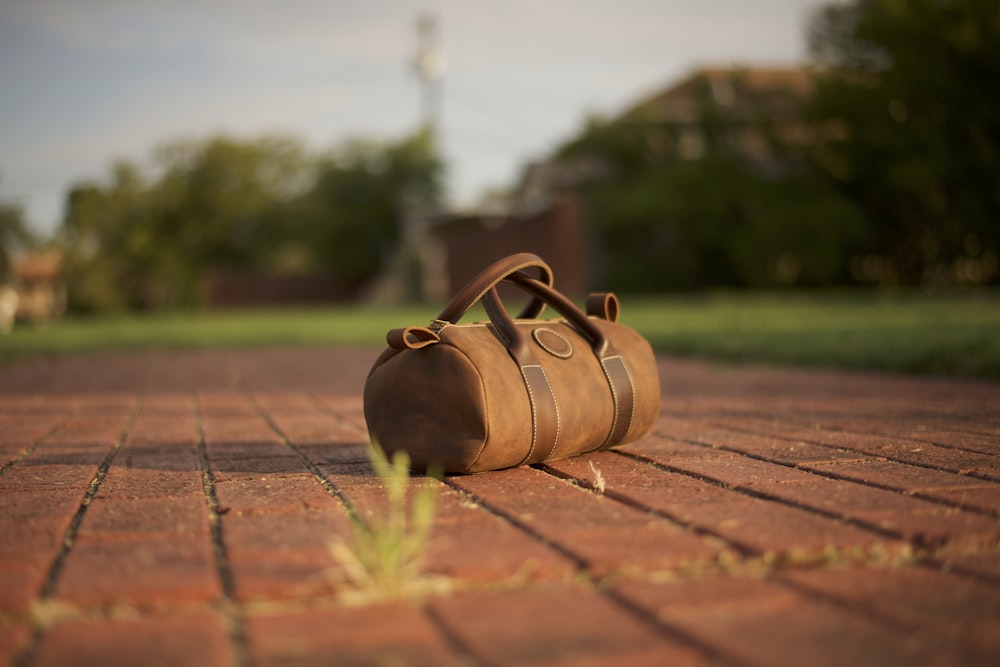 brown leather duffel bag