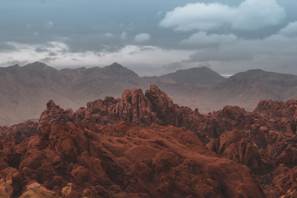 rocky mountains under gray skies