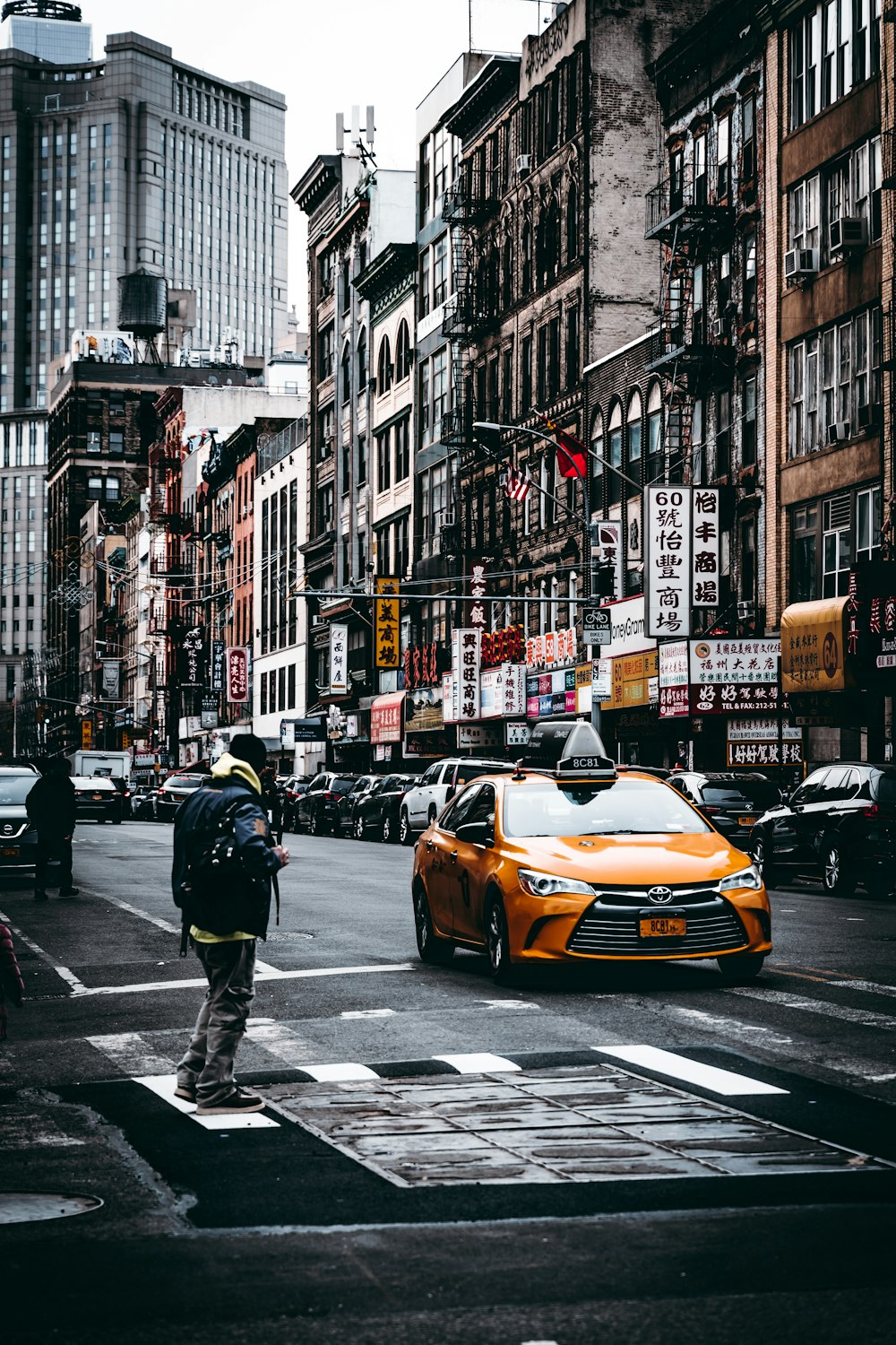 person looking at taxi