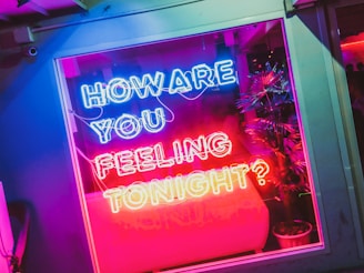 blue and red neon signage